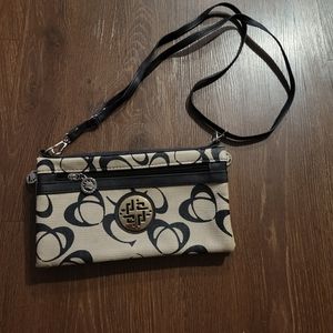 Purse with several sections 10" wide,5.5" long